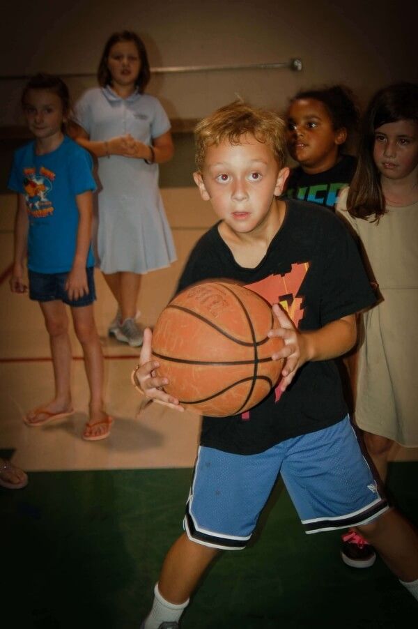 Child playing basketball